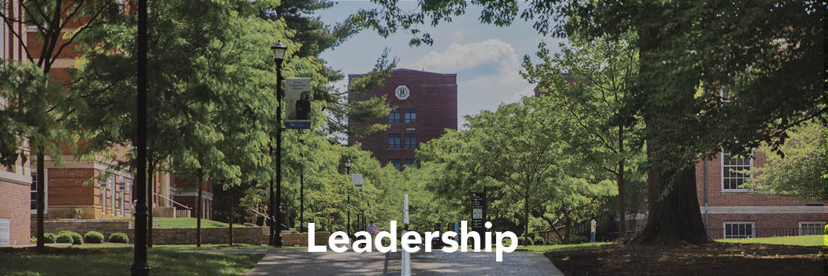A Walkway on the University of Kentucky campus, text at the bottom of the image reads Leadership.