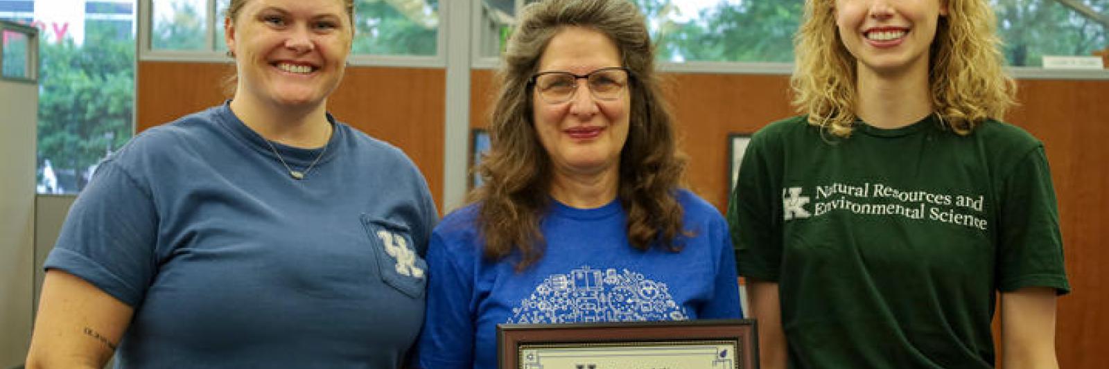 Group of three Martin Gatton College of Agriculture, Food and Environment staff receiving Sustainable Office Certification. 