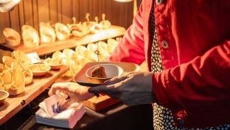 Showcase attendees eat catered local meal