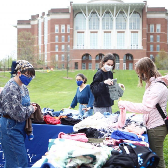 Students shop at the Pop-Up Thrift Shop in front of Willy T