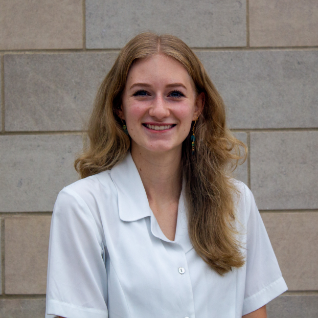 Professional headshot of Lindsey