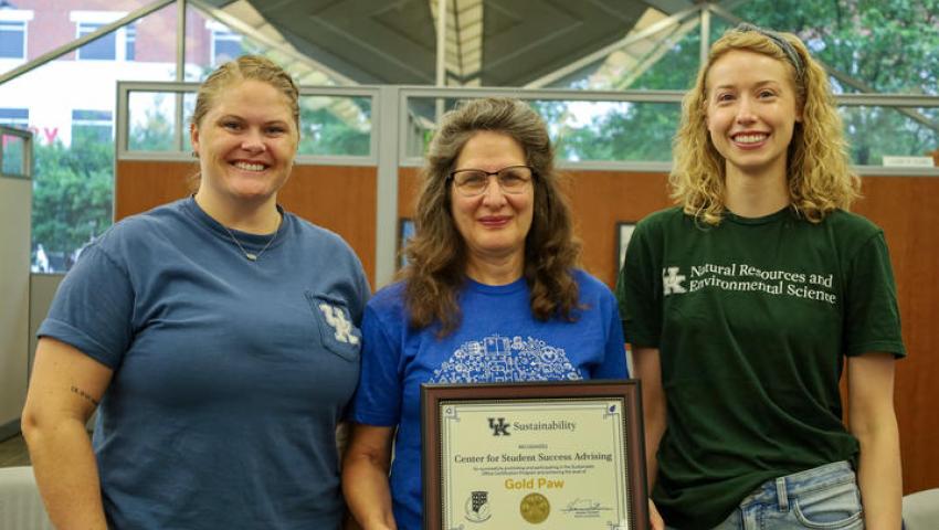 Group of three Martin Gatton College of Agriculture, Food and Environment staff receiving Sustainable Office Certification. 